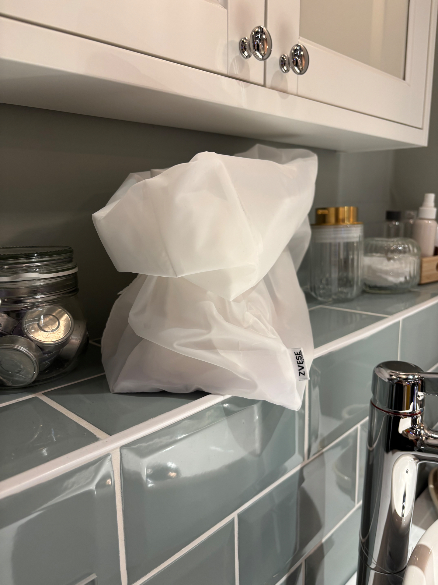 ZVESE bag on tiled bathroom shelf
