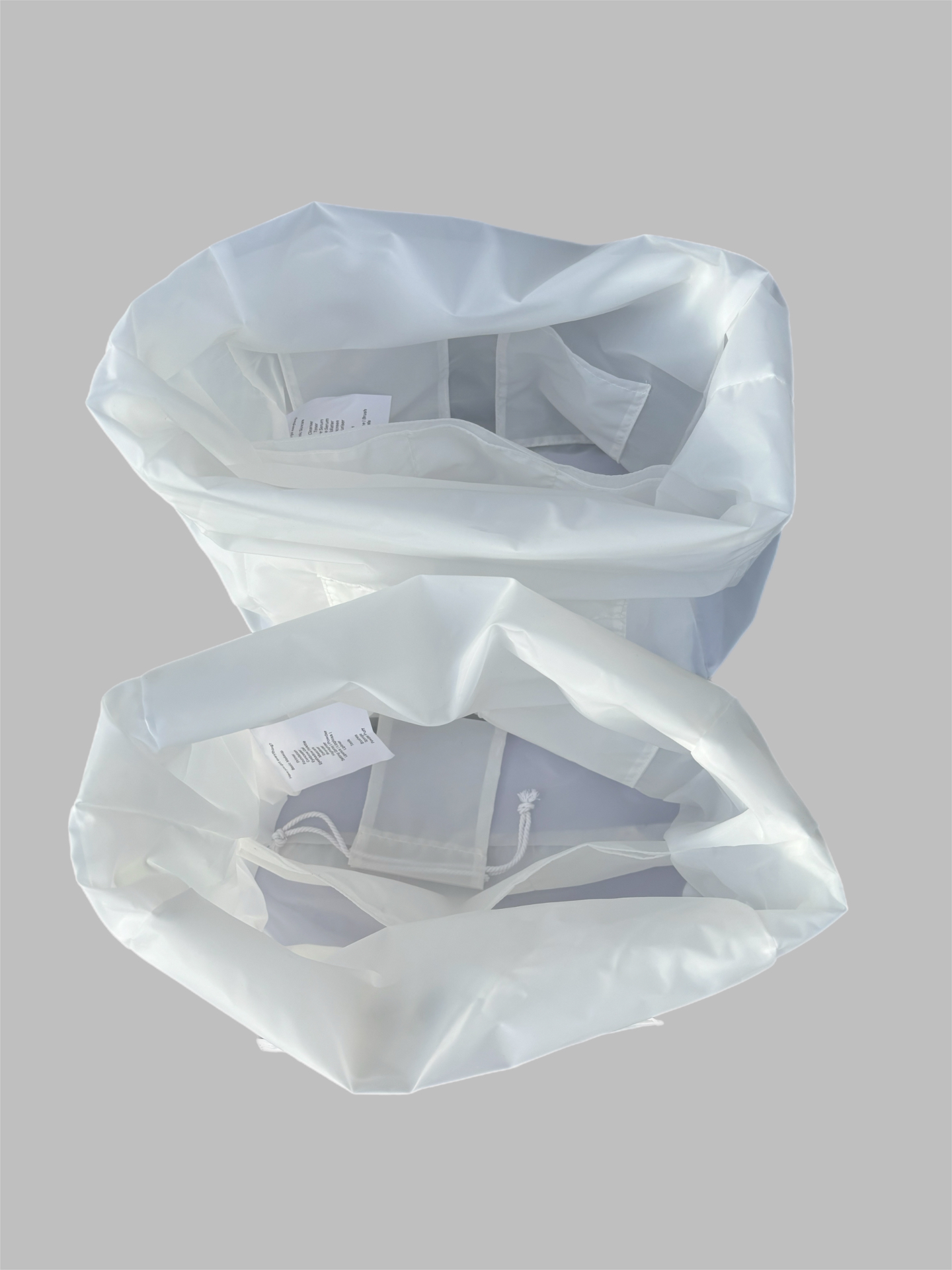 Open bag with pockets and drawstring